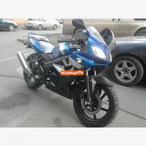 1. kp: Kymco-Quannon R3
